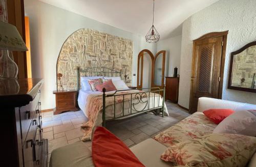 Baia Apartment | DOMUS PARVA - Villa con bio-piscina, spa privata e appartamenti panoramici