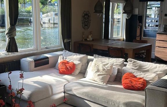 House boat on one of the beautiful canals in Amsterdam